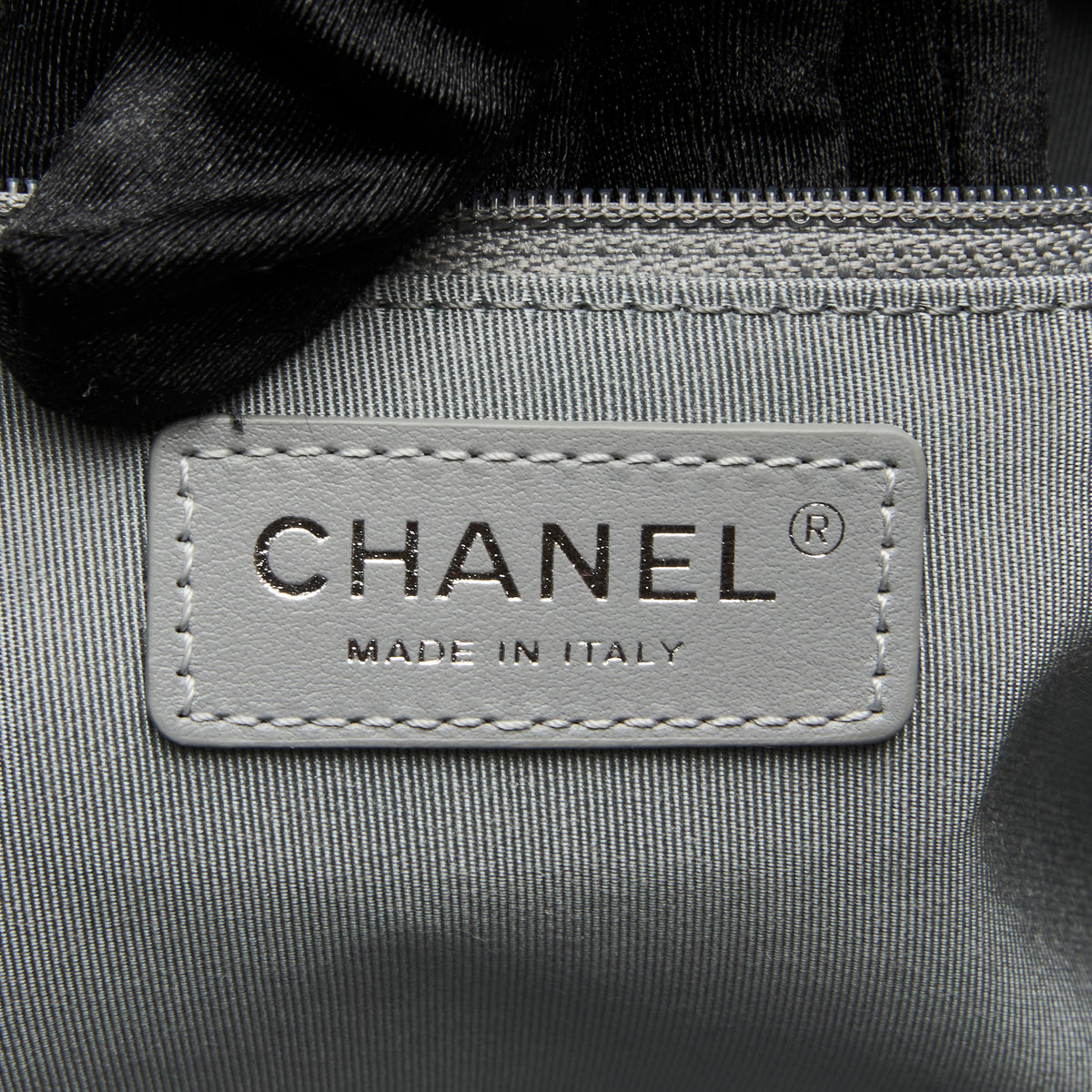 Pre-Loved Chanel™ Brushed Silver Grained Leather 24 Flap Bag