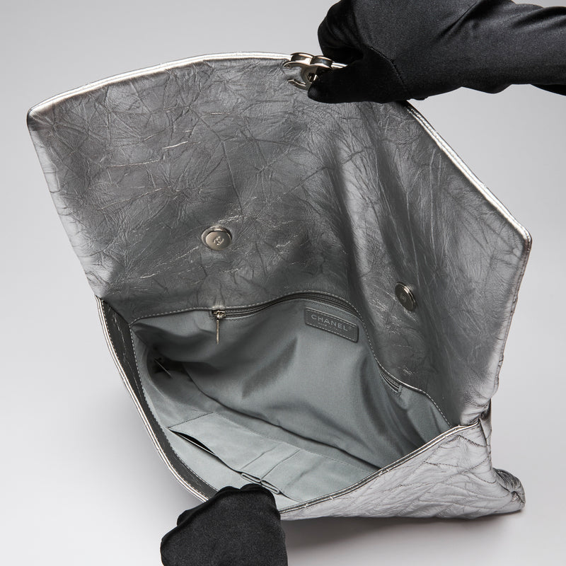 Pre-Loved Chanel™ Brushed Silver Grained Leather 24 Flap Bag