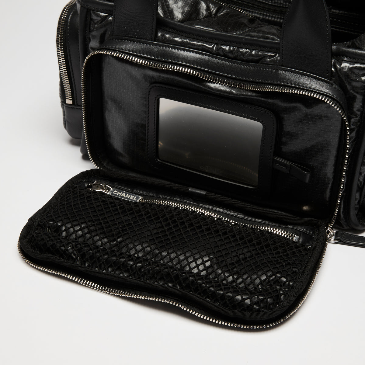 Pre-Loved Chanel™ Black Nylon Sherling Top Handle Hand Bag