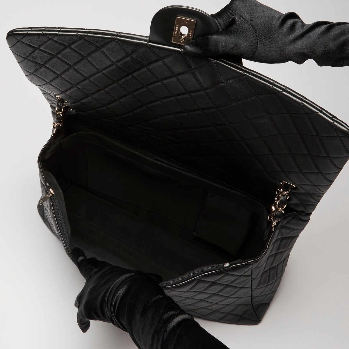 Pre-Loved Chanel™ Black Grained Leather XXL Flap Bag