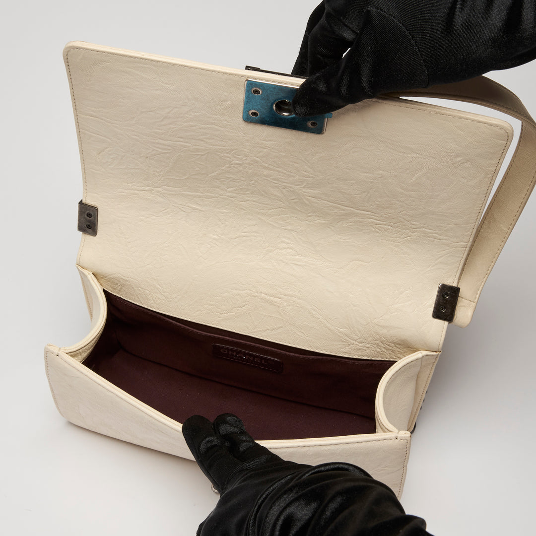 Pre-Loved Chanel™ Cream Grained Leather Boy Bag