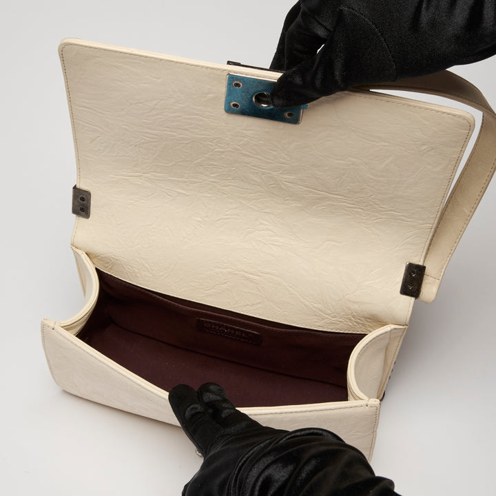 Pre-Loved Chanel™ Cream Grained Leather Boy Bag
