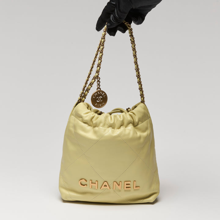 Pre-Loved Chanel™ Yellow Nappa Leather Mini 22 Crossbody Bag