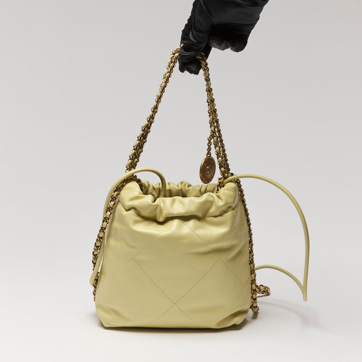 Pre-Loved Chanel™ Yellow Nappa Leather Mini 22 Crossbody Bag