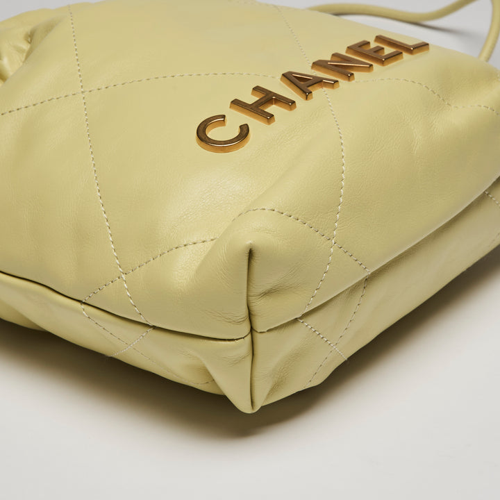 Pre-Loved Chanel™ Yellow Nappa Leather Mini 22 Crossbody Bag
