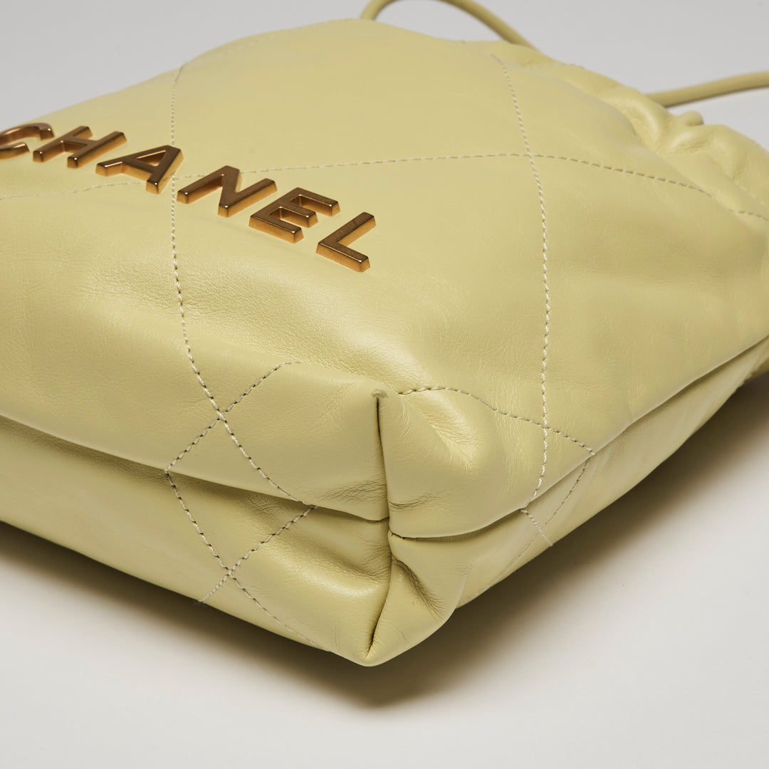 Pre-Loved Chanel™ Yellow Nappa Leather Mini 22 Crossbody Bag