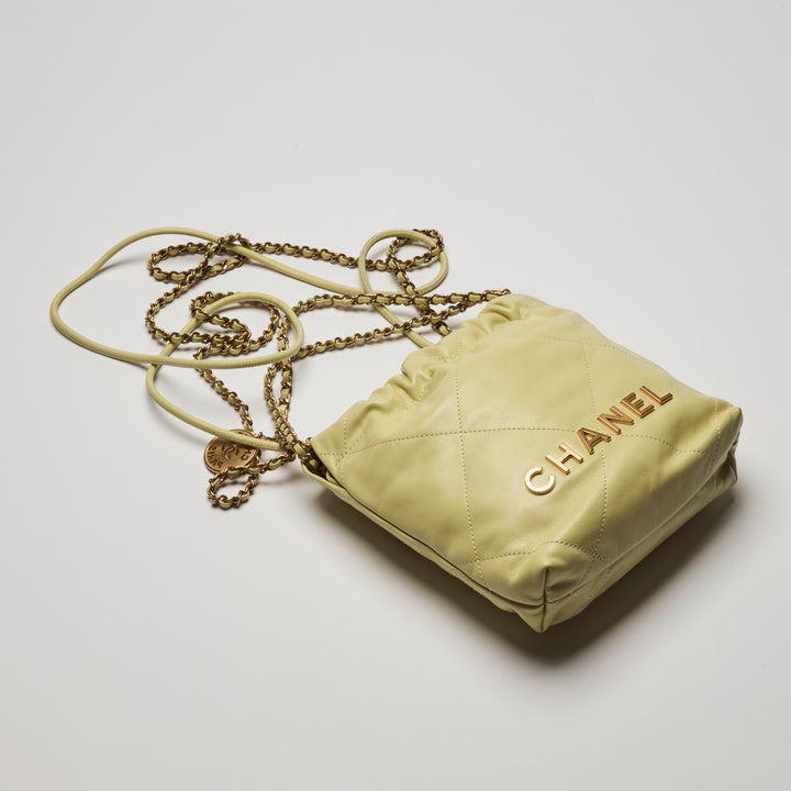 Pre-Loved Chanel™ Yellow Nappa Leather Mini 22 Crossbody Bag