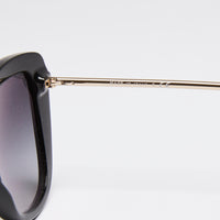 Pre-Loved Chanel ™ Black and Gold Cat-Eye Sunglasses