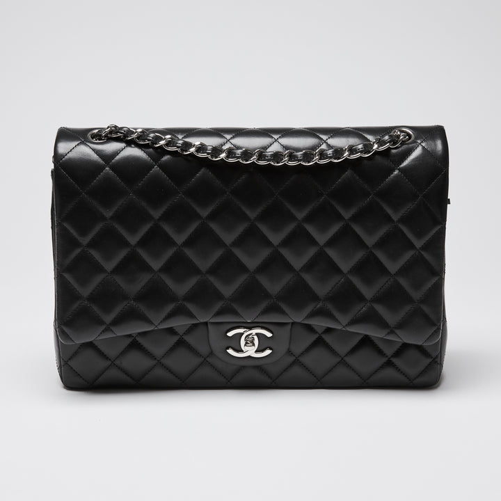 Pre-Loved Chanel™ Black Quilted Lambskin Leather Maxi Classic Double Flap Bag