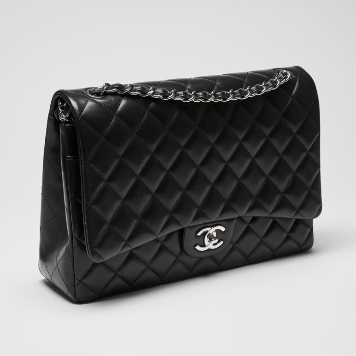 Pre-Loved Chanel™ Black Quilted Lambskin Leather Maxi Classic Double Flap Bag