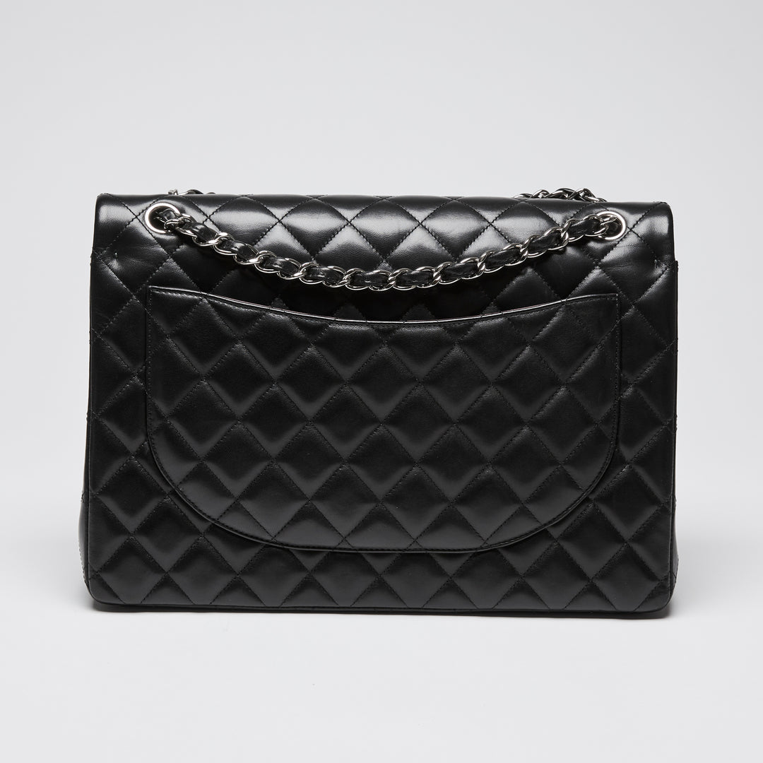 Pre-Loved Chanel™ Black Quilted Lambskin Leather Maxi Classic Double Flap Bag