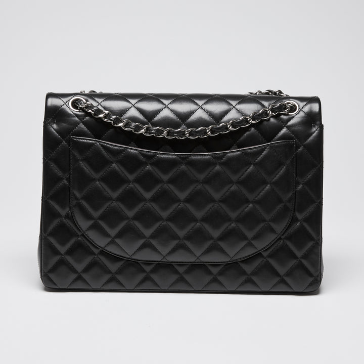 Pre-Loved Chanel™ Black Quilted Lambskin Leather Maxi Classic Double Flap Bag