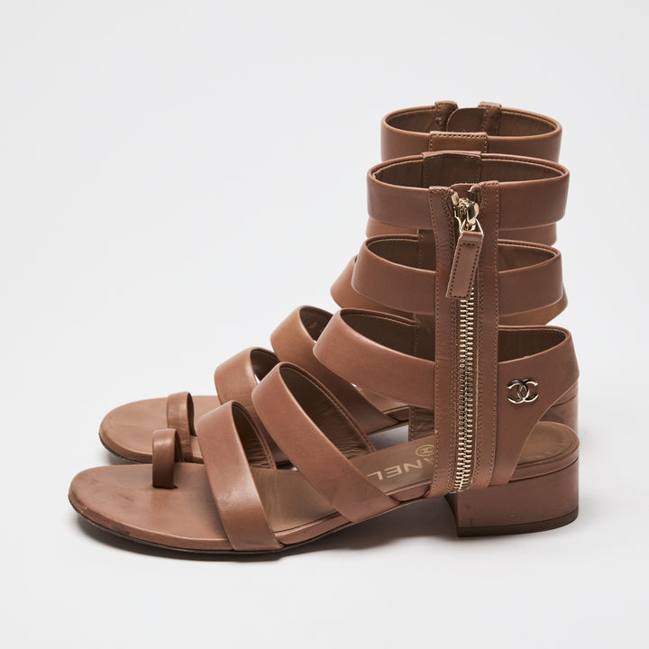 Pre-Loved Chanel™ Tan Calfskin Leather Gladiator Zip Sandals Size 36.5