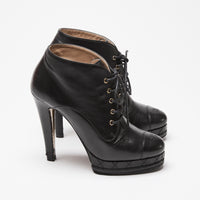 Pre-Loved Chanel™ Black Calfskin Leather Platform Heel Boots Size 38