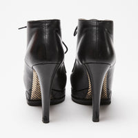 Pre-Loved Chanel™ Black Calfskin Leather Platform Heel Boots Size 38