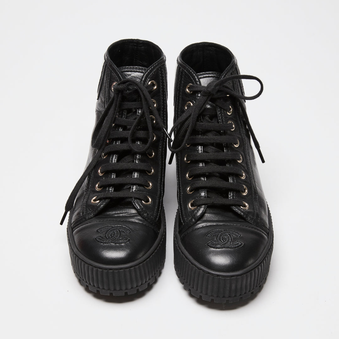Pre-Loved Chanel™ Black Calfskin Leather High Top Sneakers Size 36C