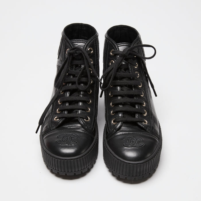 Pre-Loved Chanel™ Black Calfskin Leather High Top Sneakers Size 36C