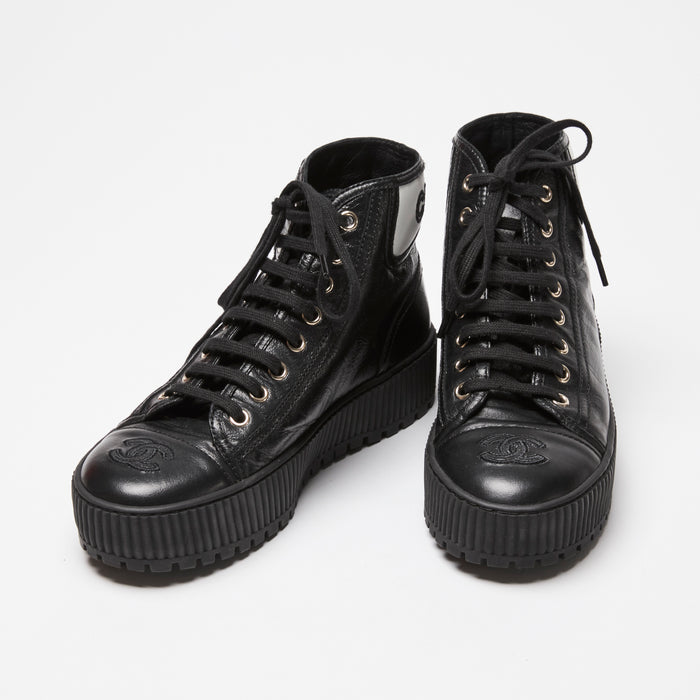 Pre-Loved Chanel™ Black Calfskin Leather High Top Sneakers Size 36C