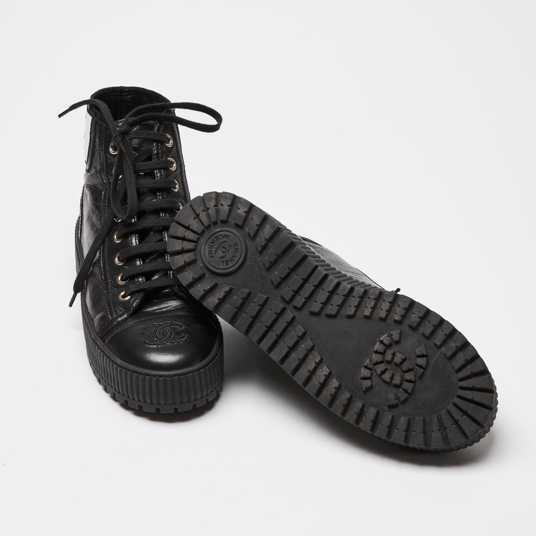 Pre-Loved Chanel™ Black Calfskin Leather High Top Sneakers Size 36C
