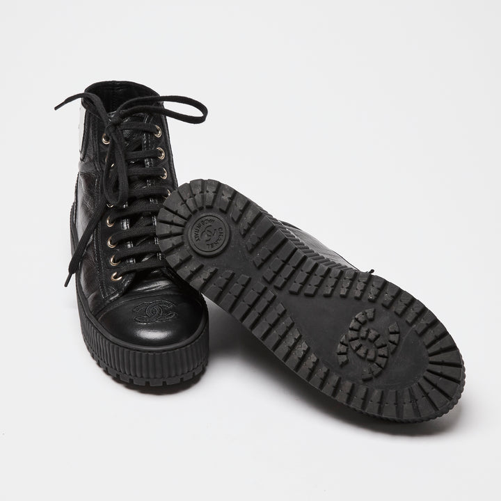 Pre-Loved Chanel™ Black Calfskin Leather High Top Sneakers Size 36C