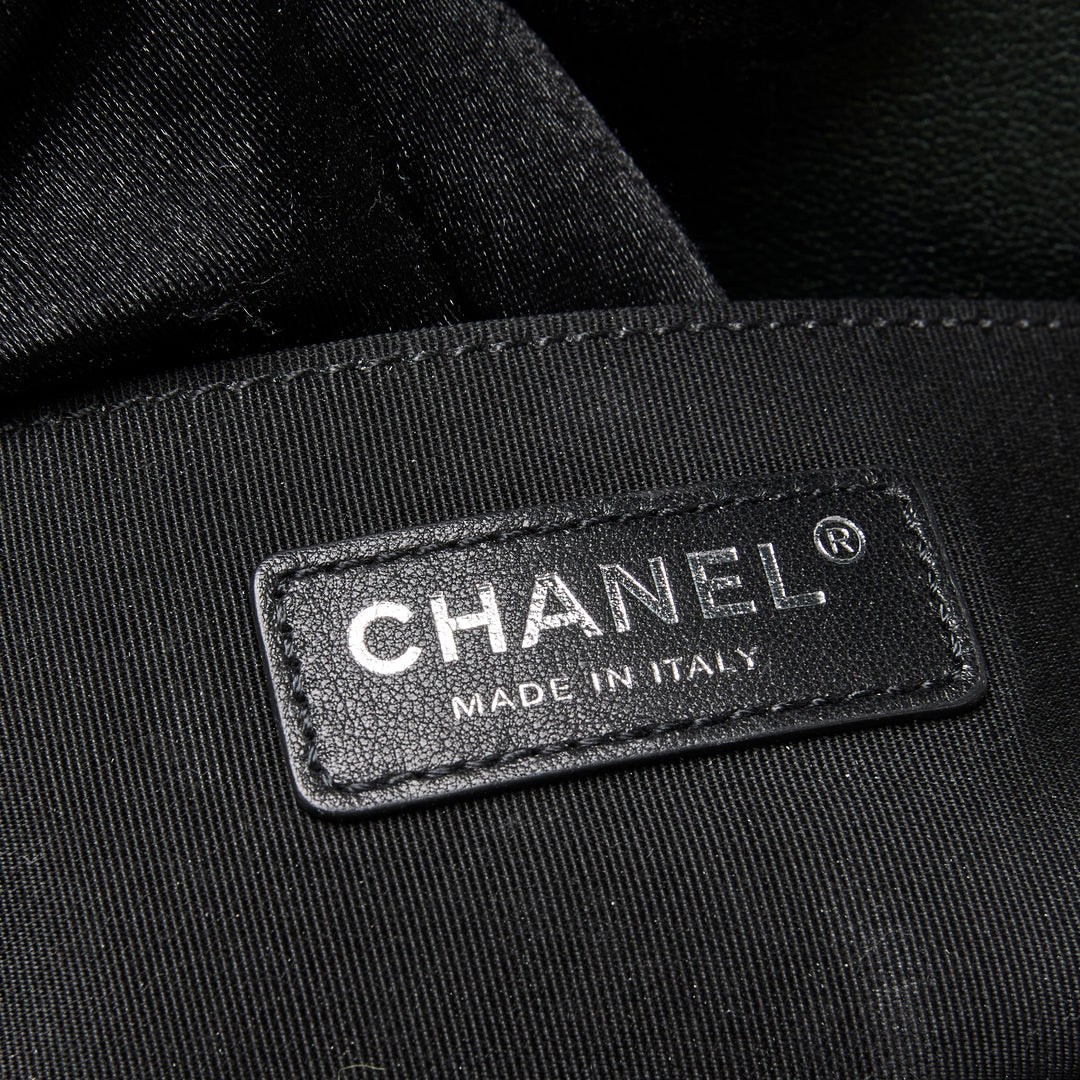 Pre-Loved Chanel™ Metallic Green Iridescent Calfskin Leather Medium Boy Bag