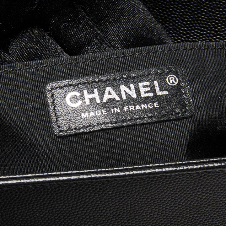 Pre-Loved Chanel™ Black Caviar Leather Medium Boy Bag