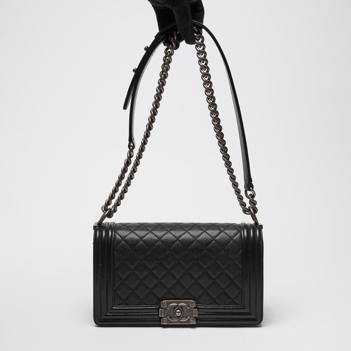 Pre-Loved Chanel™ Black Caviar Leather Medium Boy Bag