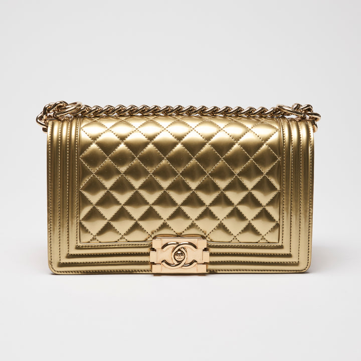 Pre-Loved Chanel™ Gold Patent Leather Medium Boy Bag
