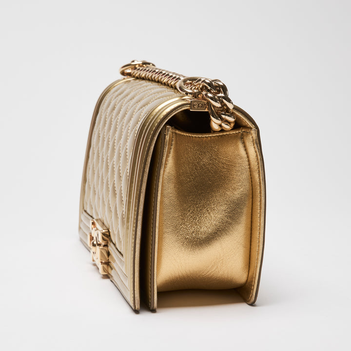 Pre-Loved Chanel™ Gold Patent Leather Medium Boy Bag