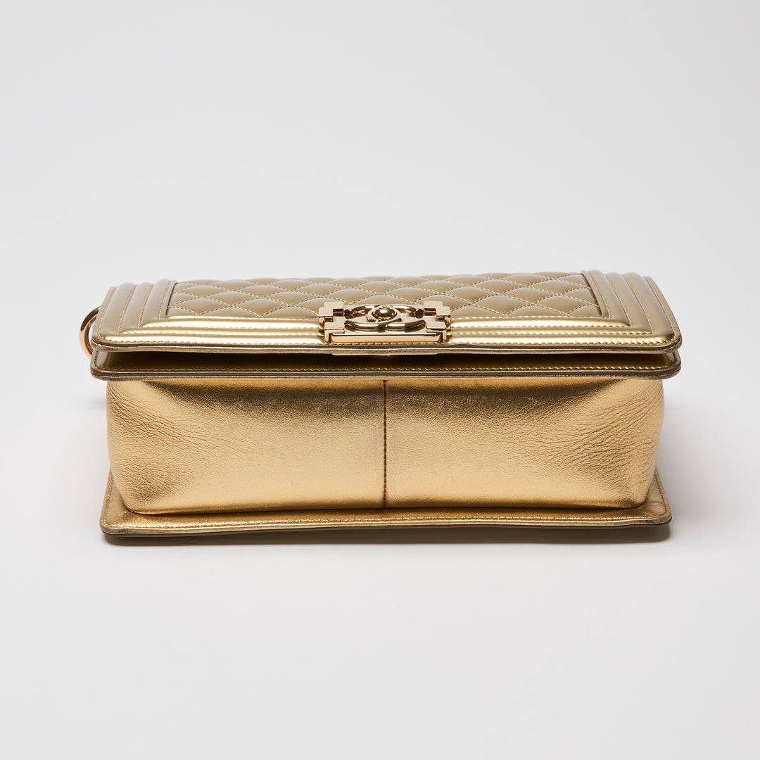 Pre-Loved Chanel™ Gold Patent Leather Medium Boy Bag