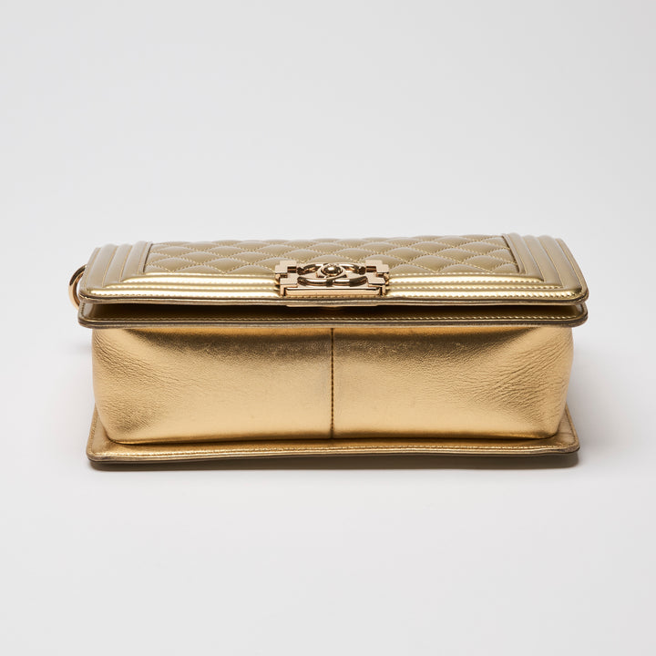 Pre-Loved Chanel™ Gold Patent Leather Medium Boy Bag