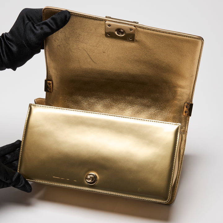 Pre-Loved Chanel™ Gold Patent Leather Medium Boy Bag