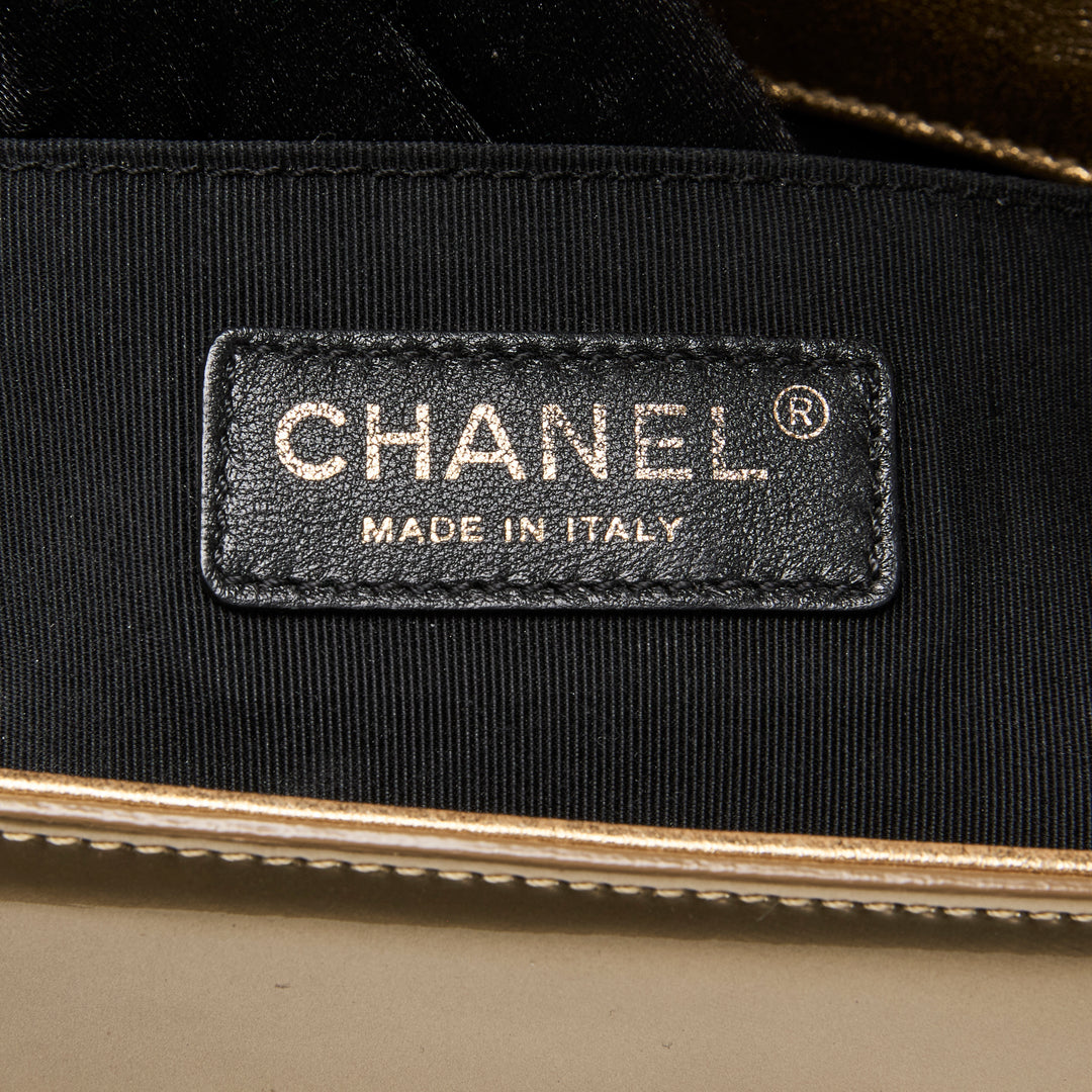 Pre-Loved Chanel™ Gold Patent Leather Medium Boy Bag