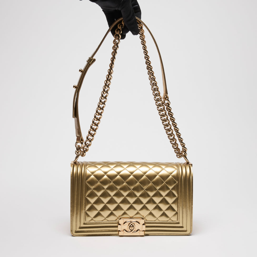 Pre-Loved Chanel™ Gold Patent Leather Medium Boy Bag