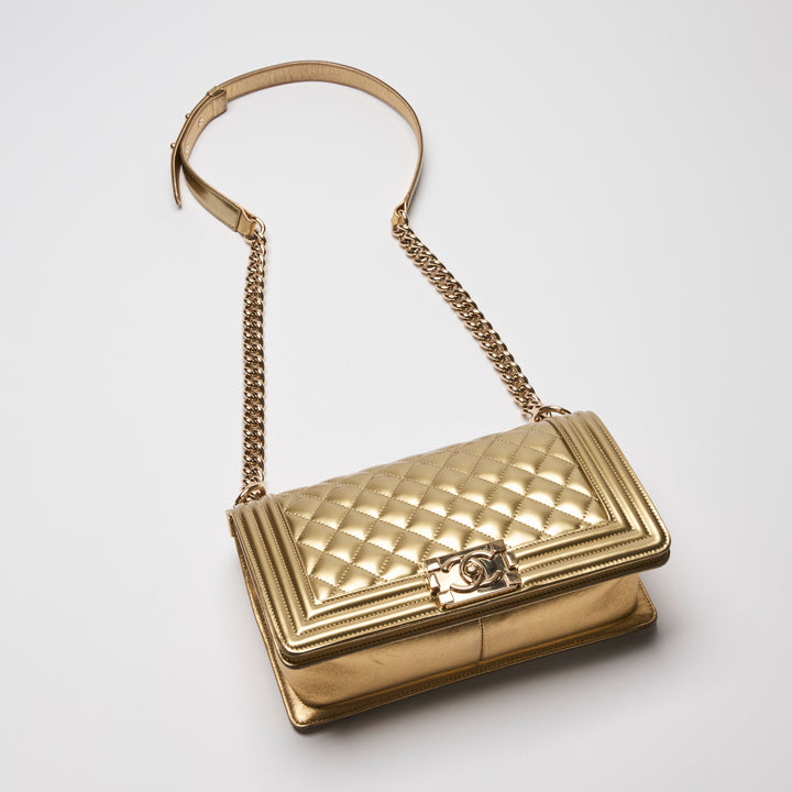 Pre-Loved Chanel™ Gold Patent Leather Medium Boy Bag