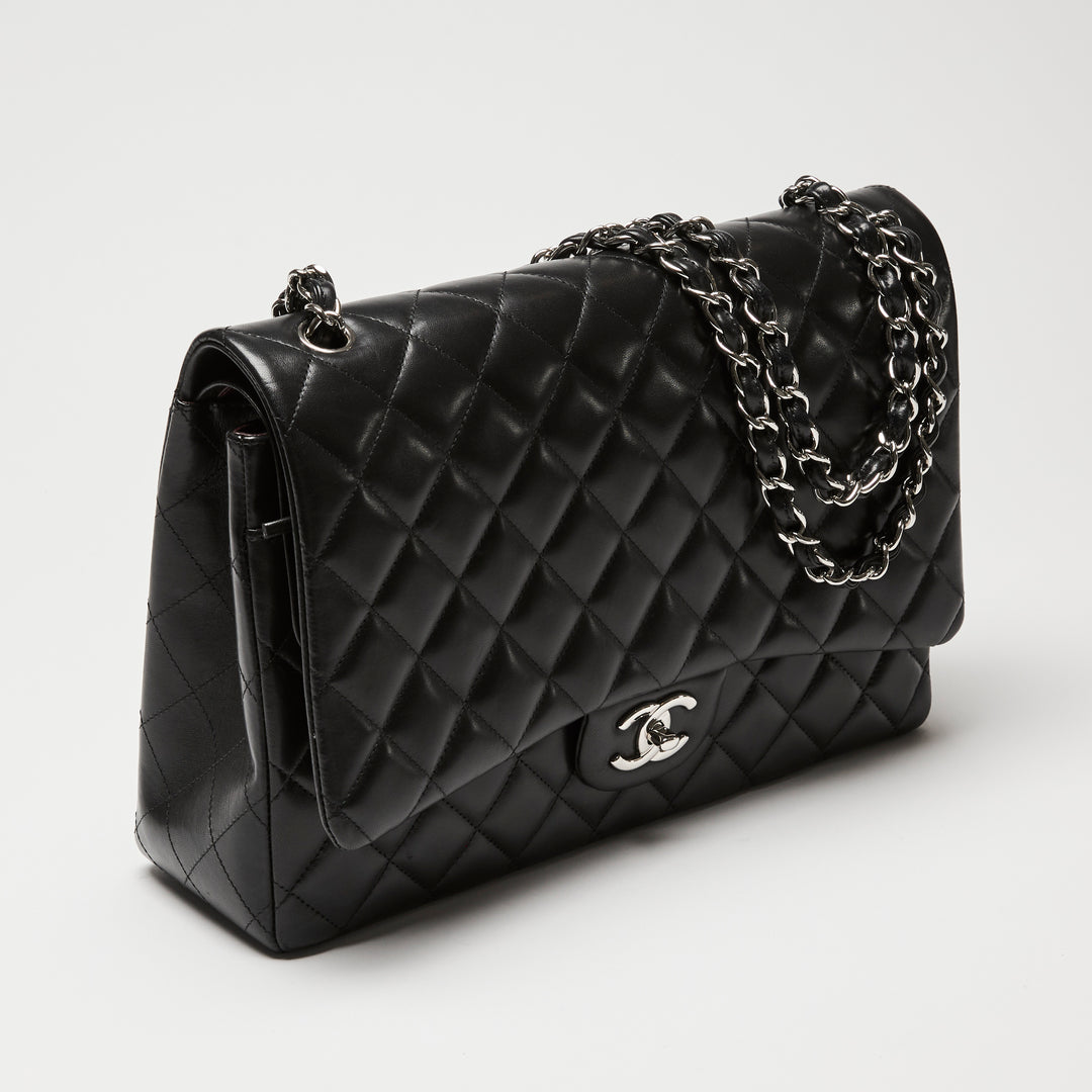 Pre-Loved Chanel™ Black Quilted Lambskin Leather Maxi Classic Double Flap Bag