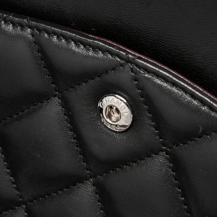 Pre-Loved Chanel™ Black Quilted Lambskin Leather Maxi Classic Double Flap Bag