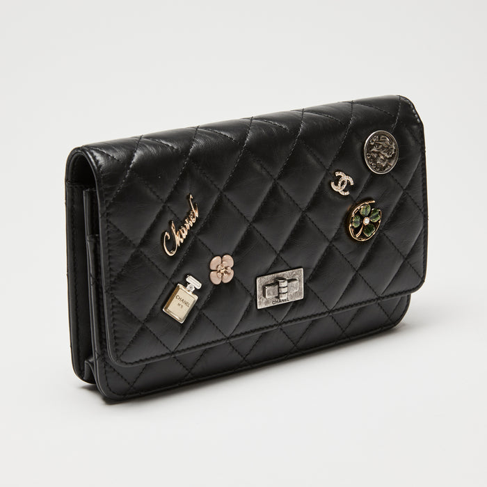 Pre-Loved Chanel™ Black Aged Calfskin Leather 2.55 Lucky Charms Wallet on Chain