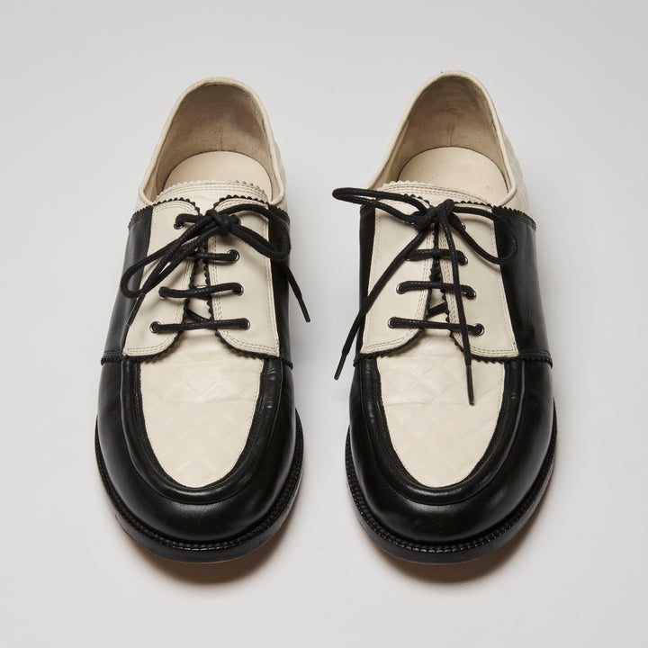 Pre-Loved Chanel™ Black Lambskin & White Calfskin Leather Derbies Size 40