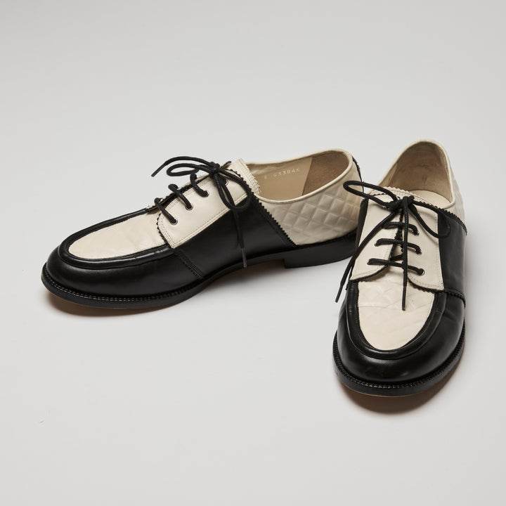 Pre-Loved Chanel™ Black Lambskin & White Calfskin Leather Derbies Size 40