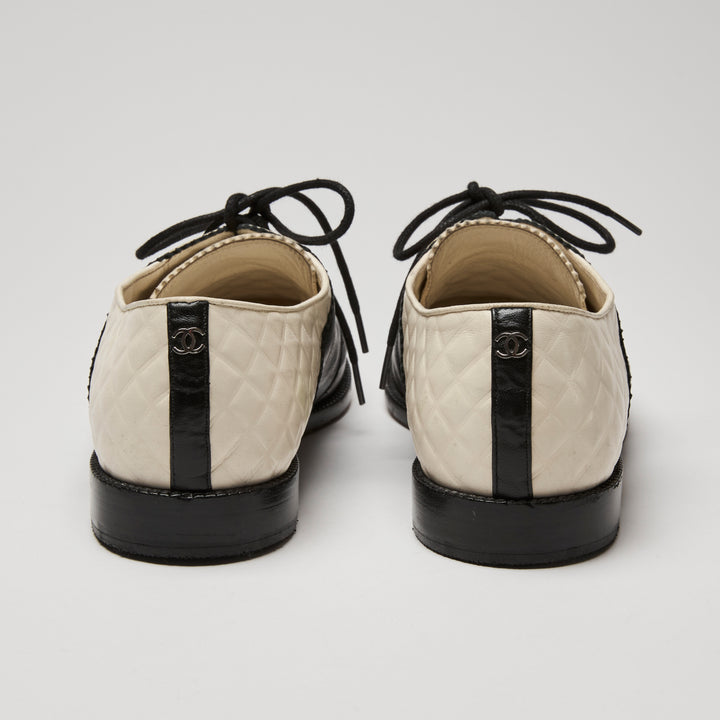 Pre-Loved Chanel™ Black Lambskin & White Calfskin Leather Derbies Size 40