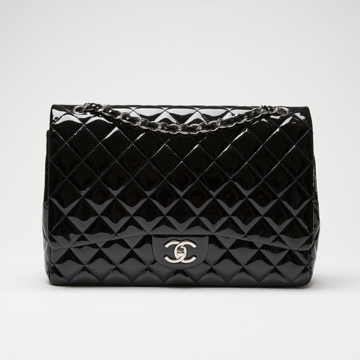 Pre-Loved Chanel™ Black Patent Leather Maxi Classic Double Flap Bag