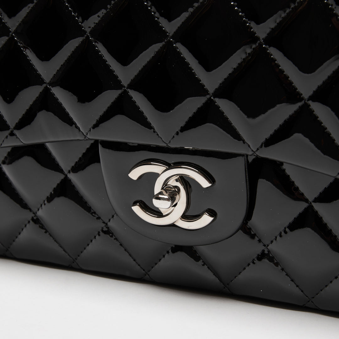 Pre-Loved Chanel™ Black Patent Leather Maxi Classic Double Flap Bag