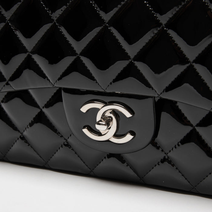 Pre-Loved Chanel™ Black Patent Leather Maxi Classic Double Flap Bag