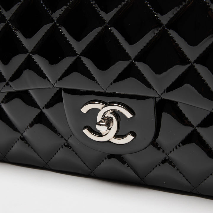 Pre-Loved Chanel™ Black Patent Leather Maxi Classic Double Flap Bag