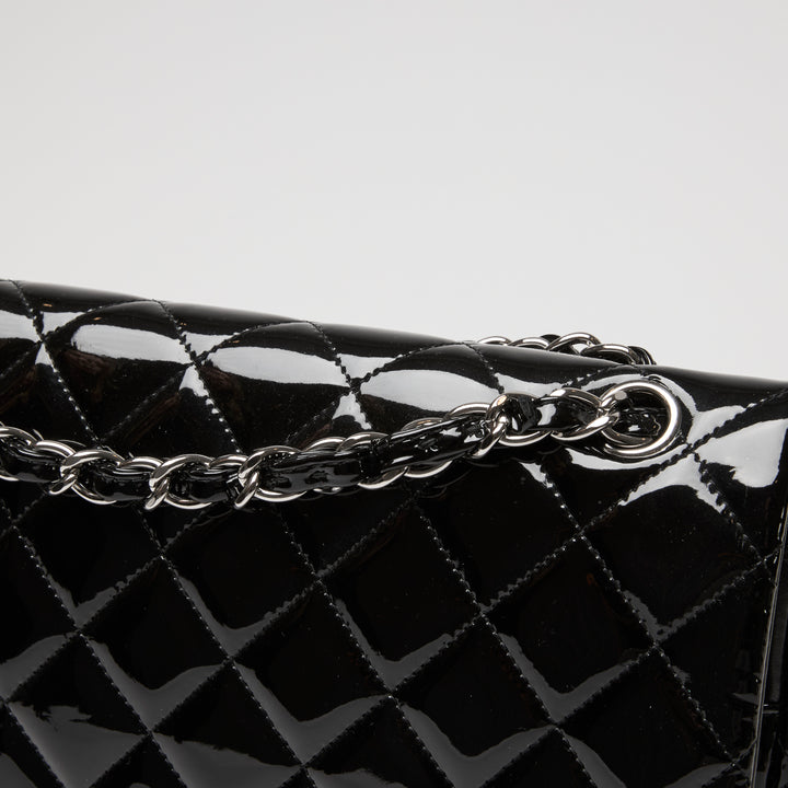 Pre-Loved Chanel™ Black Patent Leather Maxi Classic Double Flap Bag