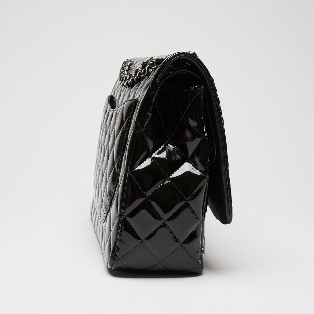Pre-Loved Chanel™ Black Patent Leather Maxi Classic Double Flap Bag
