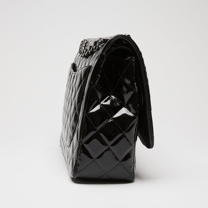 Pre-Loved Chanel™ Black Patent Leather Maxi Classic Double Flap Bag