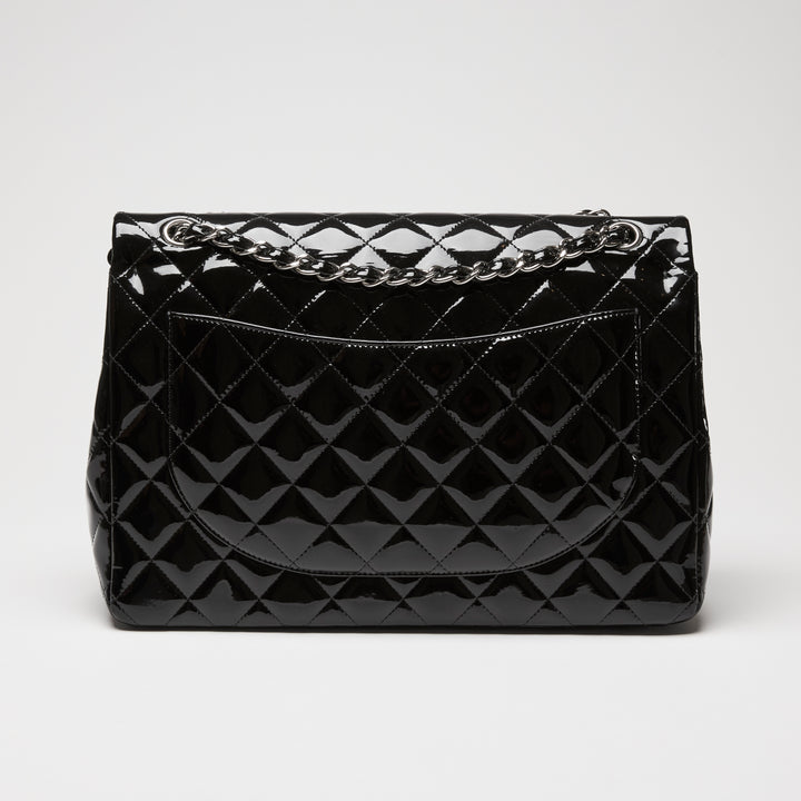 Pre-Loved Chanel™ Black Patent Leather Maxi Classic Double Flap Bag