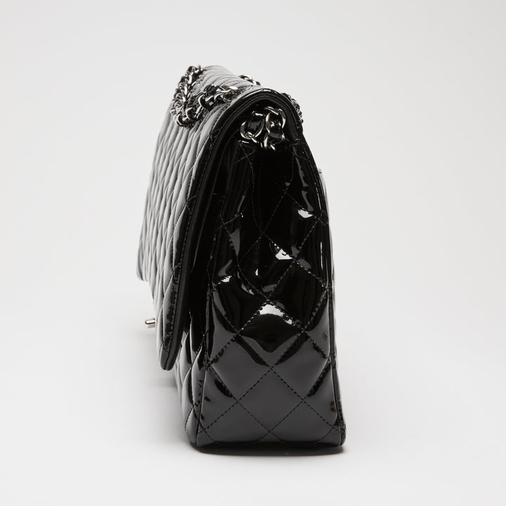 Pre-Loved Chanel™ Black Patent Leather Maxi Classic Double Flap Bag
